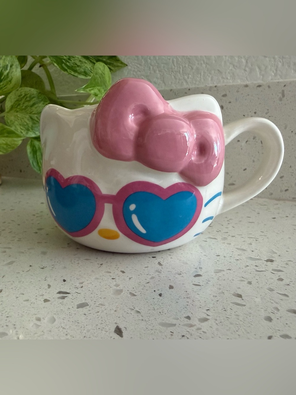 Hello Kitty White Ceramic Mug with Pink Bow and Blue Heart Sunglasses